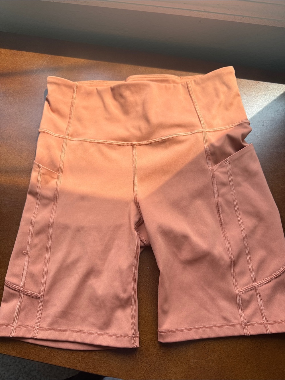 Athleta Peach/Coral High-Rise Bike Shorts with Side Pockets